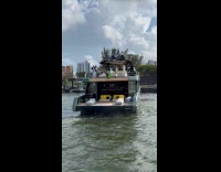 People in yacht party waves at strangers