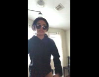 Girl in sunglasses and hoodie lip syncs Marvins Room by Drake