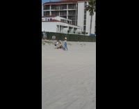 Woman white hat long blue jeans photo shoot beach Part 1