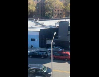 Silver car drive on the street sidewalk