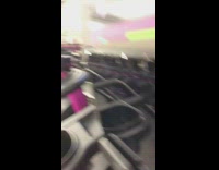 Guy runs up stairmaster machine at the gym