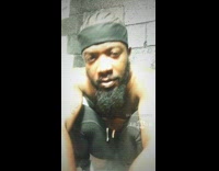 Black headband guy lip syncs outfit changes 