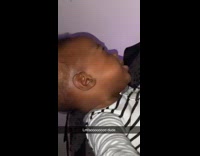 Baby boy makes funny faces at mom 