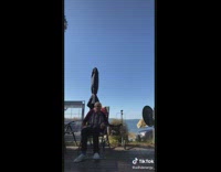 Woman sits on a walker then falls down