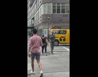 Person in zombie makeup crosses street 