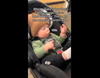 Baby learns how to do sign language