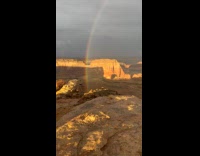 Double Rainbow with rainstorm at the desert