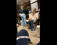 Dog on lap tries to bite smoke ring