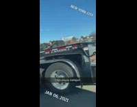 Red tow truck with yellow toy car