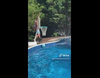 Guy in pool french bulldog dog basketball 