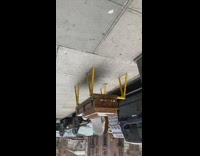 asbestos kills sign coffin hazmat suit