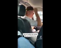 Guy rear ends into car in front of him posing for friend