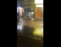 Man jump across the puddle then slipped