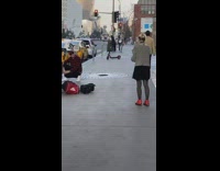 Guy poses with parked taxis 
