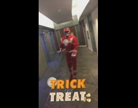 Red power ranger guy doing kicks and arm swings in hallway