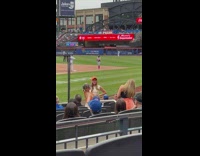Three girls stand take pictures baseball game part 2