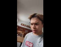 Guy opens blue cookie container sewing kit