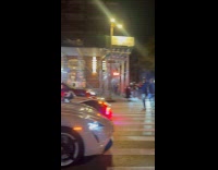 Mario rides mario kart in the city