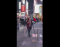 girl records news video times square