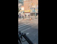 Shirtless man do stretches on the road