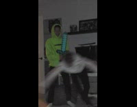 guy white shirt falls down while friends hold minecraft sword 