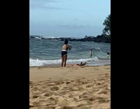 Woman red bikini hat lie down beach waves