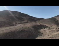 Guy flips off bike down steep dirt hill 