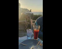 Woman black yellow floral dress sit Food Part 1