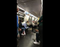 giant lizard on shoulder of a man with long hair