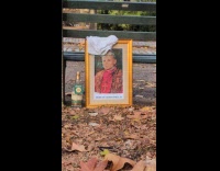 Collab winy - Pope John Paul II picture frame behind bench