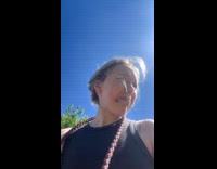 Woman filming herself being stung by wasp