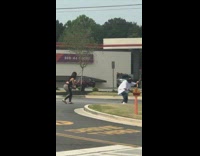 Guy white shirt hype dance drive thru