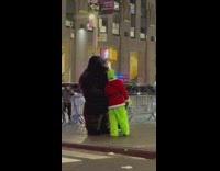 Grinch and gorilla hug 