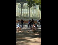 Woman blue dress tiktok dance at park