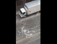 Styrofoam pieces on street form wind vortex