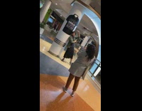 guy with long blue dress pillar sign