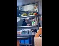 Staff flirting at kitchen restaurant 