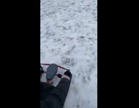 Guy watches friend on sled crash fail
