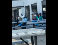 Snowboarder dances on table 