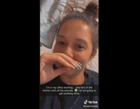 Girl records guy talking to kitten 