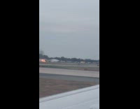 Water sprayed at vehicle in flames airport