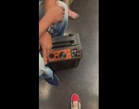 Man plays loud music with the radio inside the train