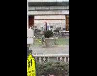 Men juggling outside new york public library