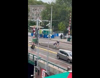 Collab IITW - Man violet jacket spins middle of street