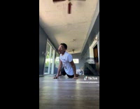 Man Accidentally Kicks Dog as he Planks