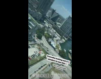 Guy records person on lifted bridge hanging on 