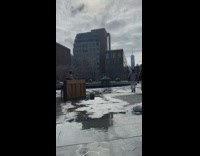 Guy on rollerblades jumps over snow piano 