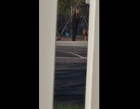 Woman violet short skirt photo shoot swing playground