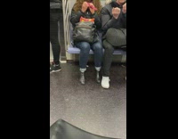 Girl files nails on subway 