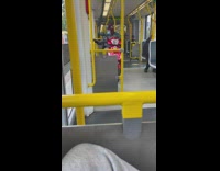 Guy sits on motorcycle on bus ride 